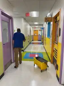 applying wax to vct flor