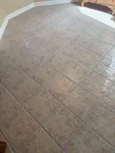 Travertine tile after grout cleaning and color sealing