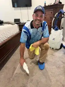 Billy spot cleaning carpet in Memphis TN