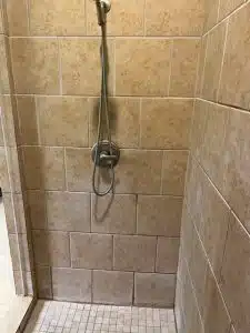 Before shower cleaning with soap scum and hard water deposits in Collierville TN